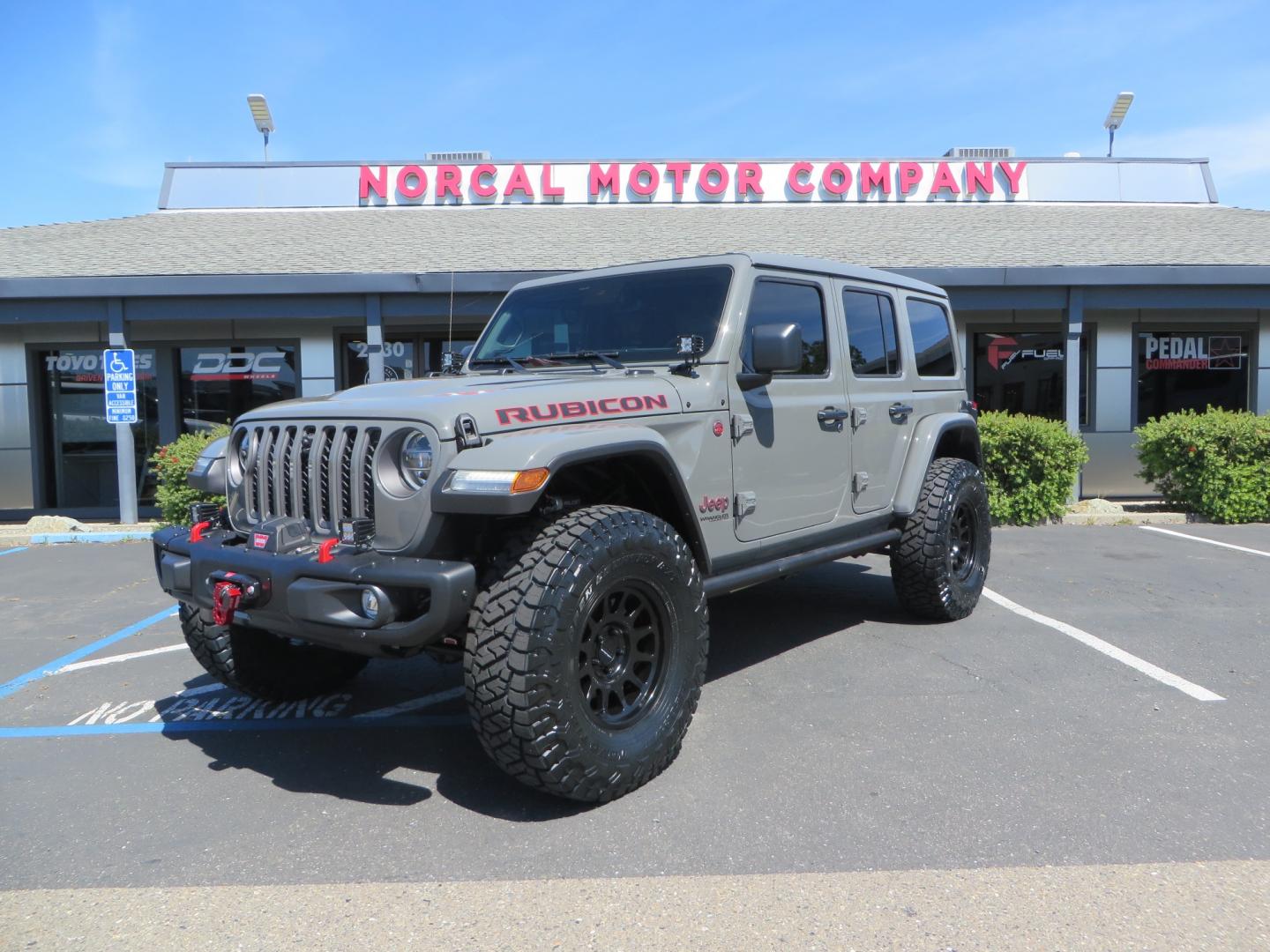 2021 Sting Grey /BLACK Jeep Wrangler Unlimited Rubicon (1C4JJXFM5MW) with an 3.0L V6 DOHC 24V TURBO DIESEL engine, 6A transmission, located at 2630 Grass Valley Highway, Auburn, CA, 95603, (530) 508-5100, 38.937893, -121.095482 - Diesel JL with Sky One power top featuring a Teraflex suspension system, Falcon adjustable shocks & steering stabilizer, Full Metal Cloak skid plate, 17" Method bead grip wheels, 37" Toyo RT Trail tires, Warn winch, Rigid Led lighting, Teraflex HD spare tire carrier, Teraflex Diff covers, Amp steps, - Photo#0